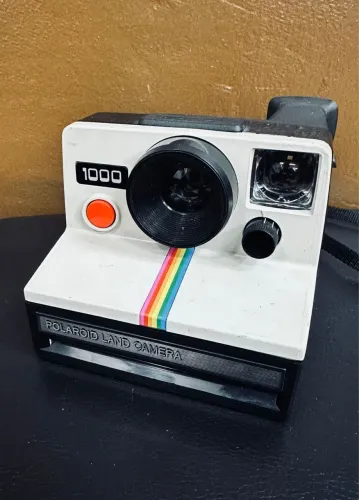 Câmera Polaroid Land 1000