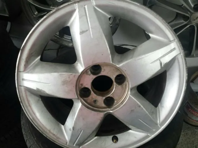 Roda aro 16 Estrela Prata esportiva Gm Corsa 4X100 jogo usado