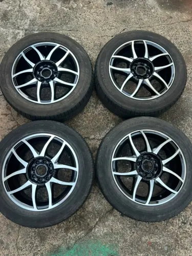 Jogo de rodas aro 15 multifuro 4x100/4x108 com pneus meia vida