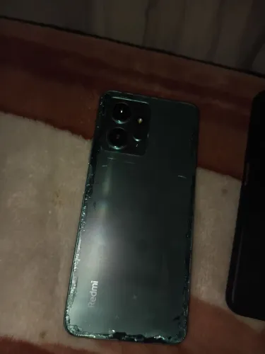 Vendo redmi 12 128 giga funcionando perfeitamente 300 reais
