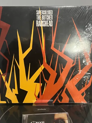 RADIOHEAD - SUPERCOLLIDER / THE BUTCHER - VINIL - 12pol - IMPORTADO- NM