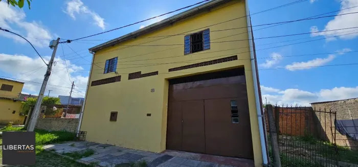 Casa no bairro Restinga - 3 dormitórios