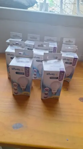 Kit 9 Lâmpadas LED Galaxy 7W Bivolt Luz Quente 3000K E27 - Na Caixa