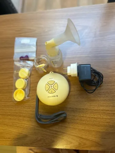 Bomba de tirar leite medela swing