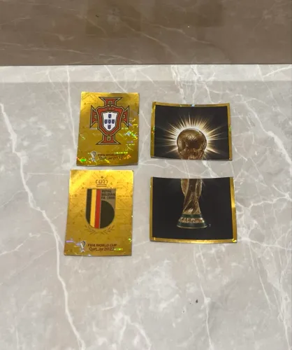 Figurinhas da copa 2022 panini douradas