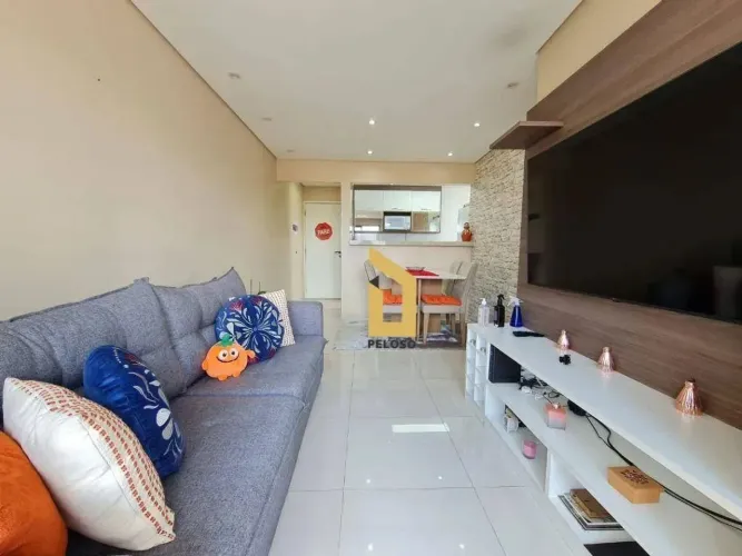 Apartamento à venda | 52m² | 2 dormitórios | varanda com fechamento em vidro | 1 vaga | la