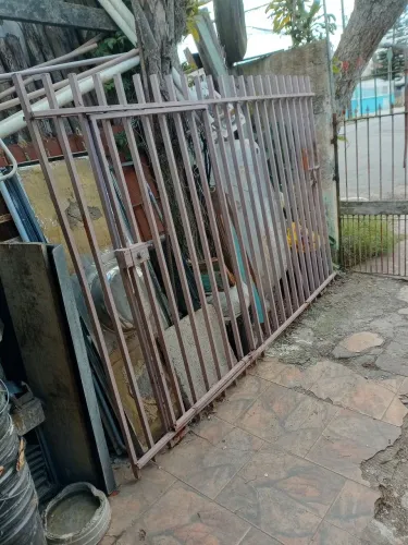 Um portão de correr pra reforma 