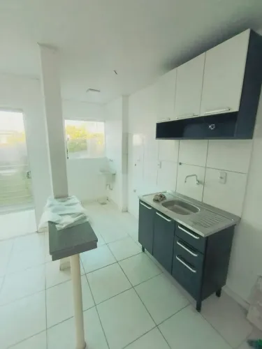 Alugo apartamento 2 quartos (1 suíte) primeiro andar condomínio com área de lazer completa