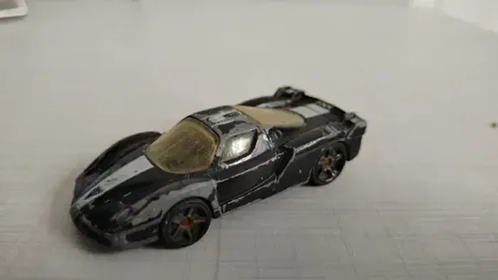 Miniatura Ferrari Fxx Hot Wheels 1/64 Preta
