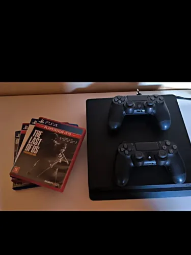 Ps4 slim 1 TB +jogos e 2 controles