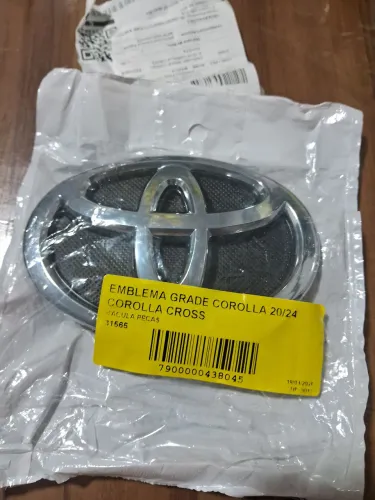 Emblema de Corolla Cross 24