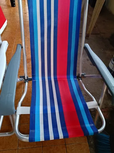 Cadeira de praia e guarda sol