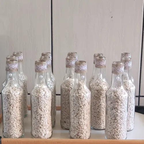 Vendo 20 garrafinhas de vidro decoradas para arranjos de mesa 