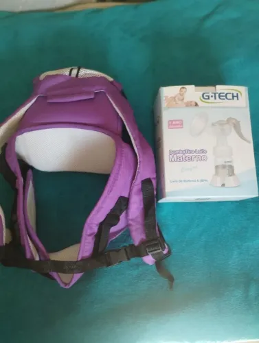 Vendo esse canguru infantil de menina roxo e uma bomba de tirar leite