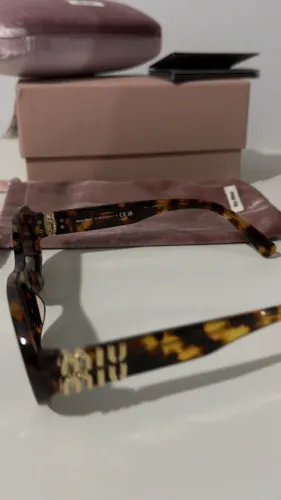 Óculos Sol Miu Miu Original MU06ZS onça
