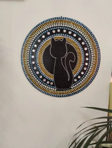 Decorativo de parede gato em volta de olho grego