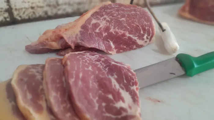 Açougueiro  e auxiliar