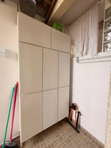 Armário de lavanderia planejado branco