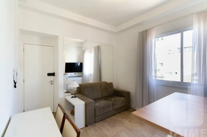 Predio com conceito diferenciado, integrado à um prédio residencial e lojas no Térreo.