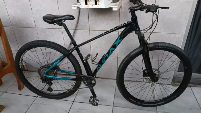 Vendo bike aro 29 aldax freio hidráulico trlava da suspensão no guidão 1x11 coroa dev 32