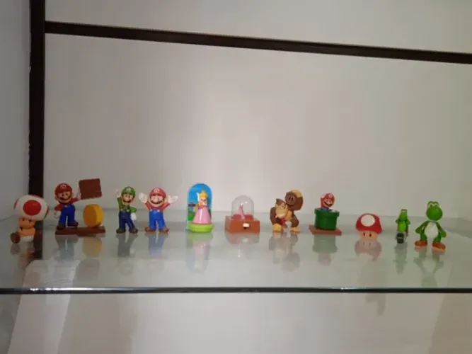 coleção de bonecos super mario contem 11 peças