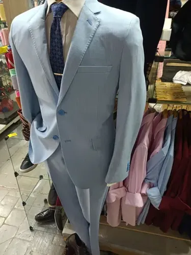 Costume (paletó e calça) azul claro última peça 50/44 499,