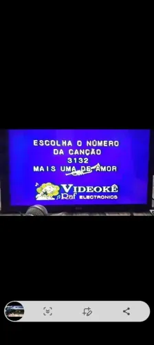 Tv LG com karaoke e microfones completo