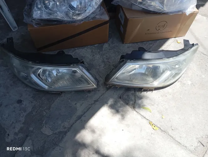 PAR FAROL ONIX JOY CROMADO ORIGINAL GM ( VALEO)