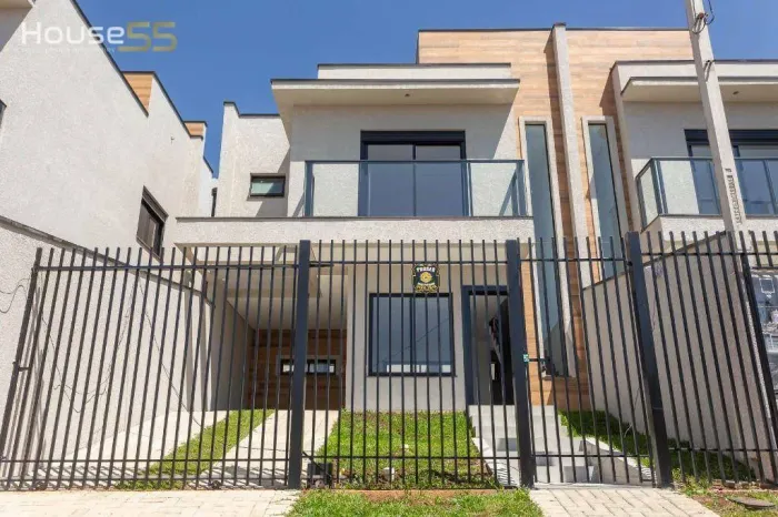 Sobrado com 3 dormitórios à venda, 103 m² por R$ 620.000,00 - Atuba - Curitiba/PR