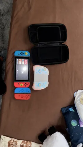 Vendo e troco Nintendo SWITCH v2 e triciclo elétrico de drift