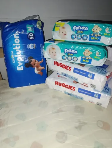 5 pacotes de fraldas tamanho M