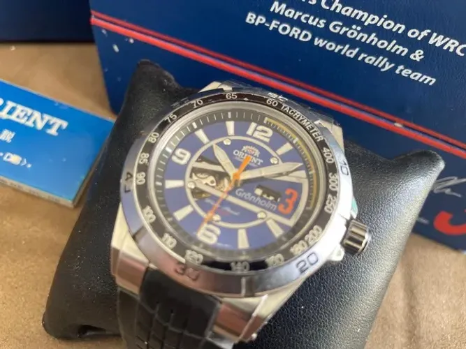 RELÓGIO ORIENT MARCUS GROHOLM CHAMP OF WRC 2007 LIMITED EDITION AUTOMATIC 44MM BLUE DIAL 