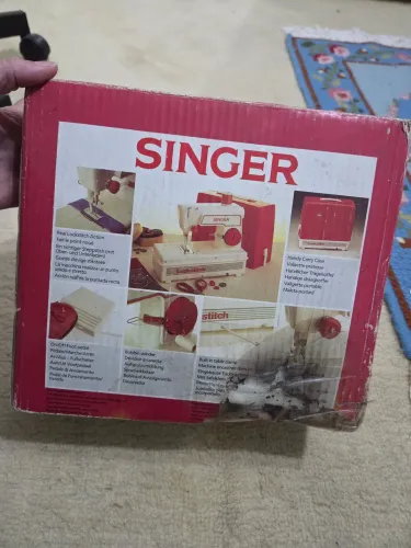 Mini máquina de costura Singer