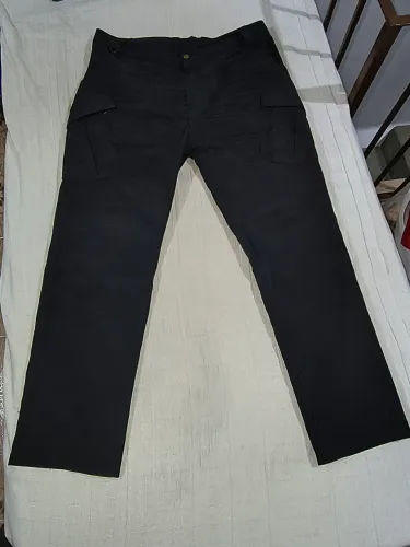 Calça Tática Preta, tamaho 46, contem 8 bolsos, excelente para trabalhar no dia a dia.