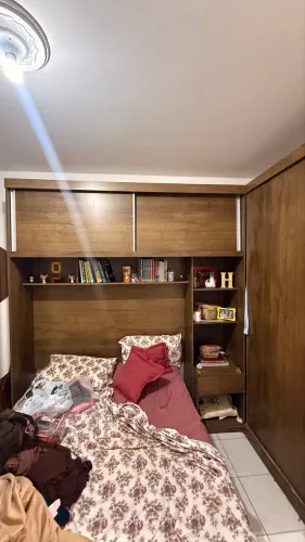 Guarda roupa com cama embutida 