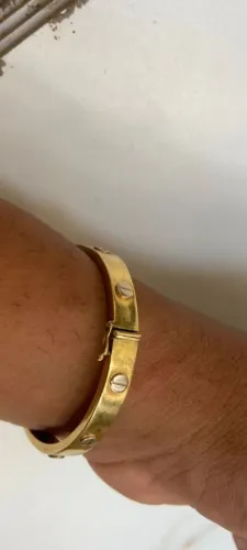 Bracilete de ouro 18k grande vendo ou troco ele pesa 22 g valor a negociar 11.000