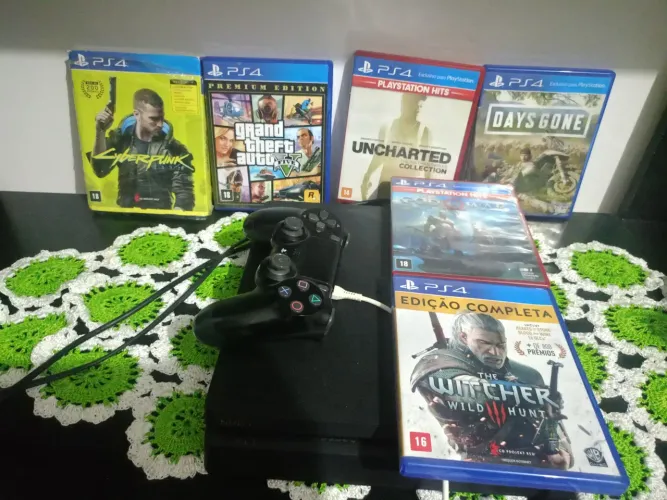Ps4 pra vender, com esses jogos que estar nas fotos 1controle carregador