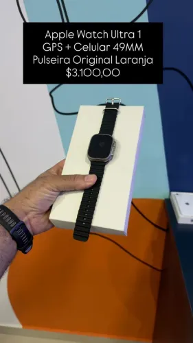 Apple Watch Ultra 1 / Semi novo / Bateria: 99% / 49mm / Pulseira original Laranja / $3.100
