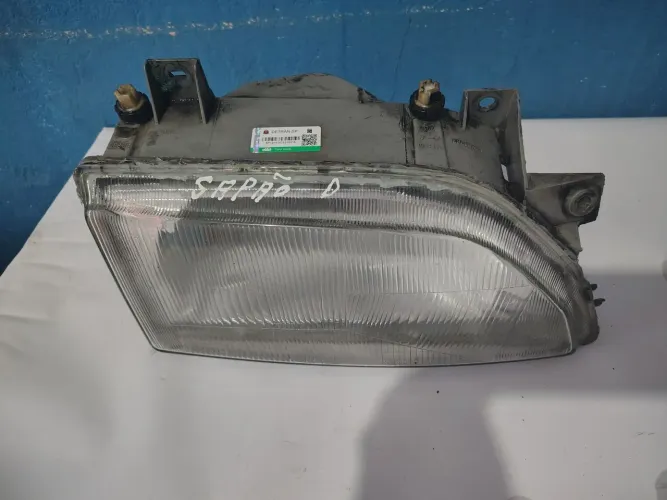 Farol Escort sapão lado direito ano 1993 A 1997 usado 