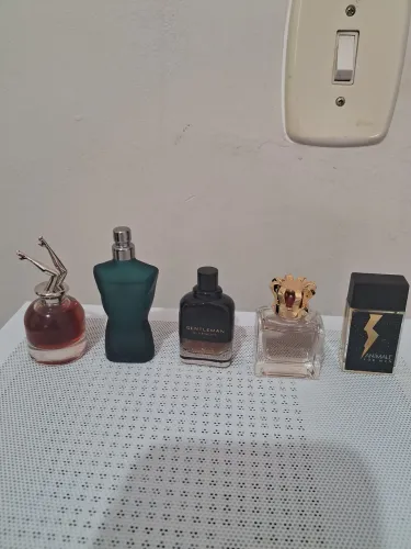 Miniaturas perfumes novas com caixas valor por unidade 