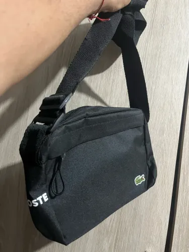 Bolsa nova preta lacoste unissex