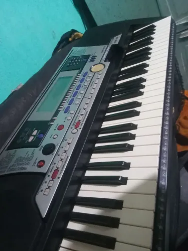 Teclado yamaha PSR 550 troco por E473
