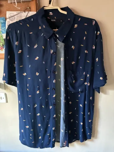 Camisa de botão