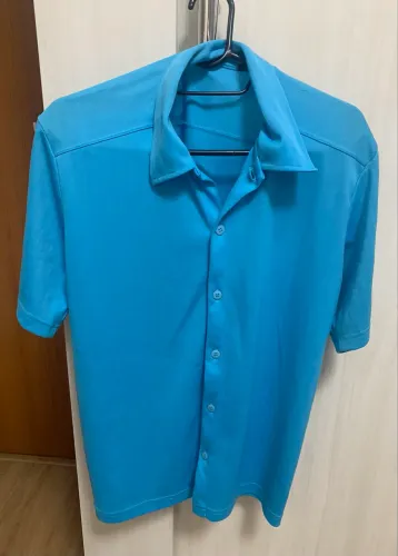 Vendo linda camisa polo social azul em elastano nova