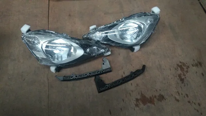 Farol e guia suporte Honda new Fit 2009 até 2014