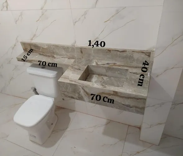 Pia com extensão de braço esculpida em porcelanato