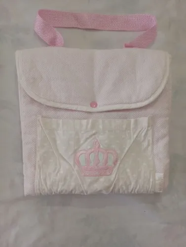 Trocador vira bolsa bebê