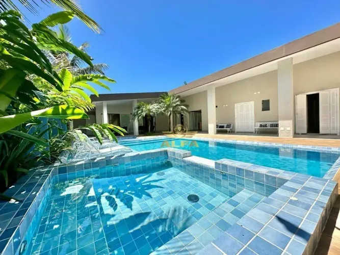 Casa com 6 suítes à venda, Mobiliada e decorada, Condomínio Jardim Acapulco Guarujá.