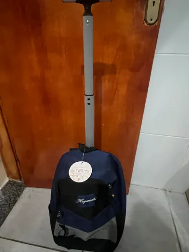 Mochila  nova na etiqueta  Harry potter rodinhas e costas com alça 