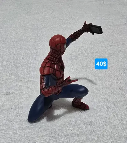 Miniatura do Homem-Aranha tirando selfie 